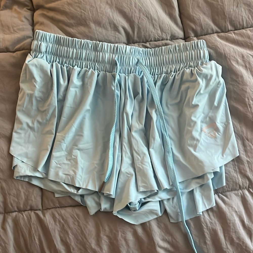 light blue flowy atheletic shorts